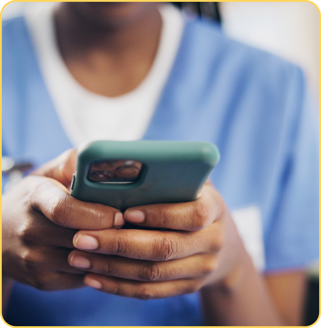 A picture of a male nursing working with Therap mobile app on his phone